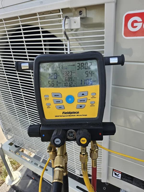 Gauges connected for refrigerant charging
